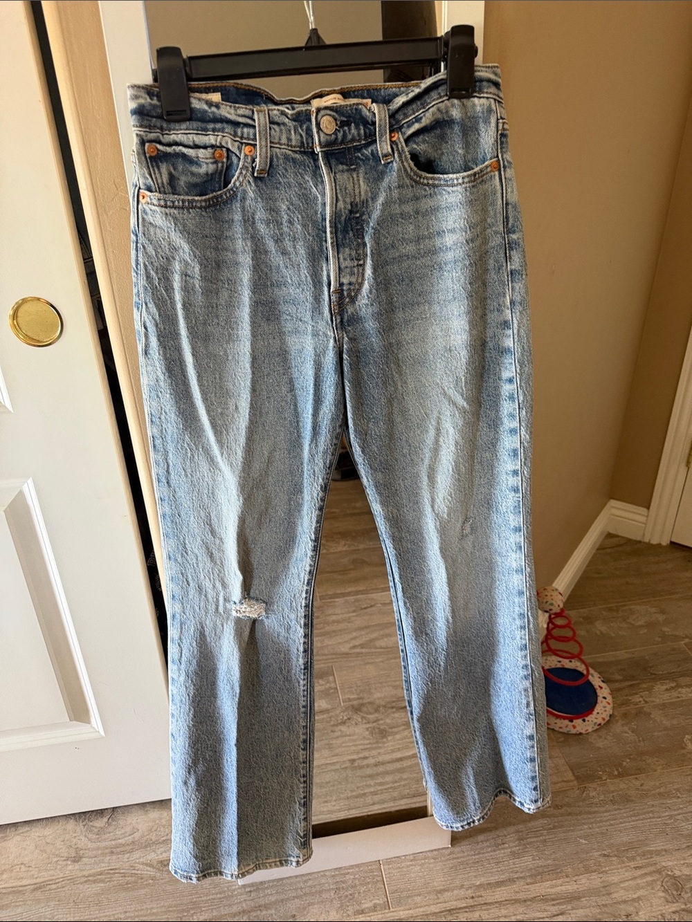 Levis wedgie bootcut light wash high rise distressed denim jeans.